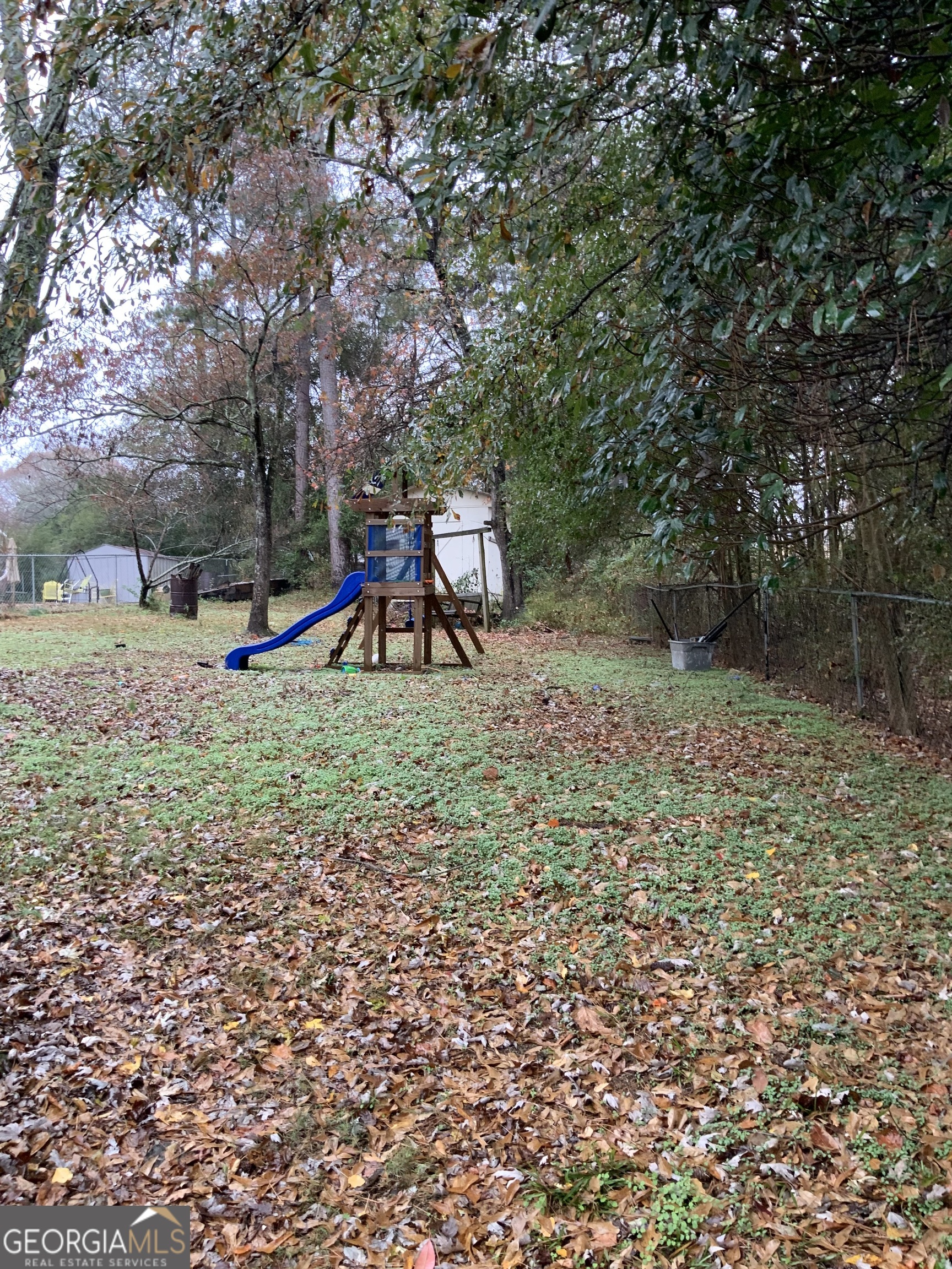 10065 Brass Ring Road Jonesboro, GA 30238 - Photo 44 of 48 a view of a park with large trees