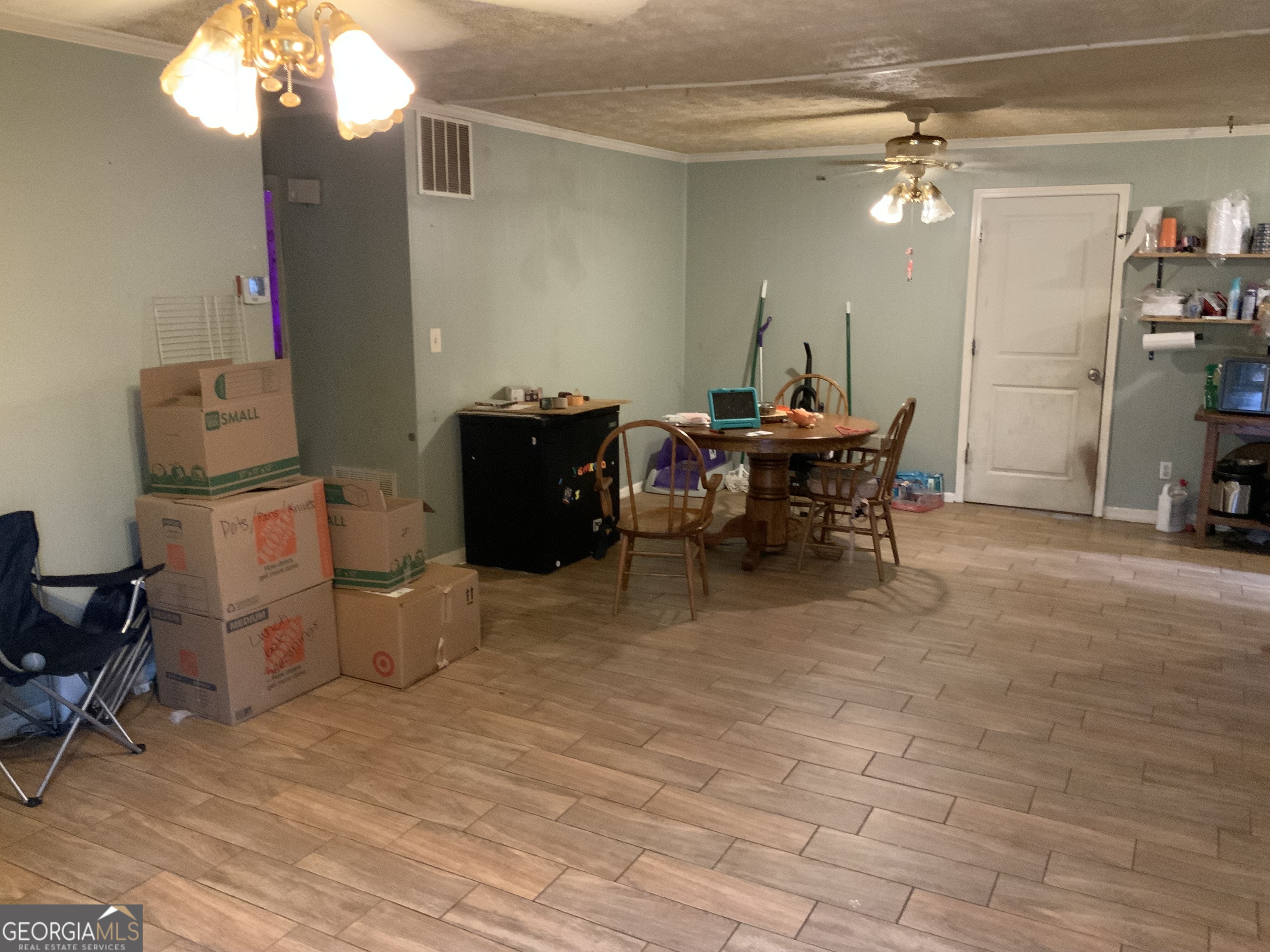 10065 Brass Ring Road Jonesboro, GA 30238 - Photo 6 of 48 a view of a workspace with furniture