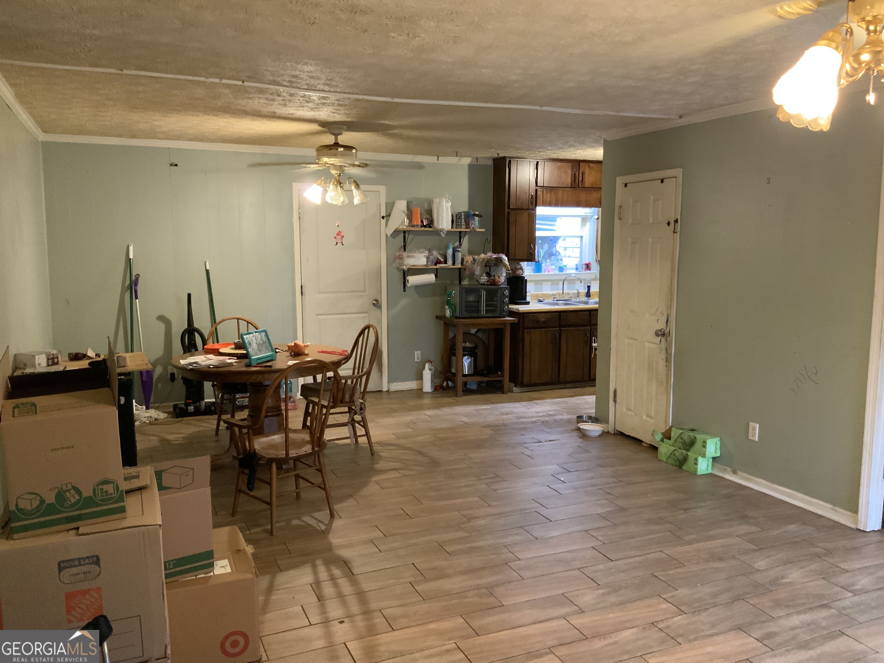 10065 Brass Ring Road Jonesboro, GA 30238 - Photo 7 of 48 a view of a dining room with furniture