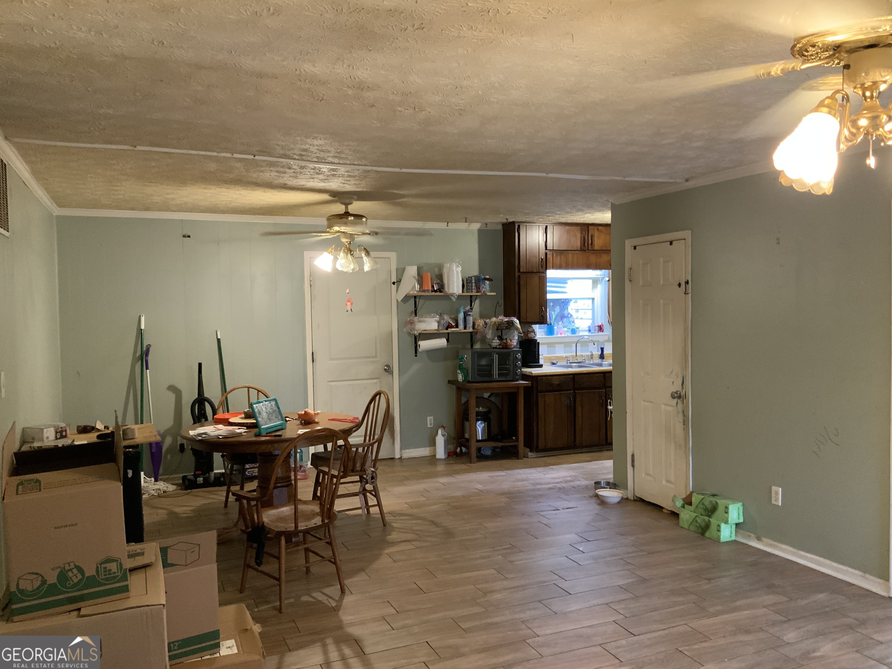10065 Brass Ring Road Jonesboro, GA 30238 - Photo 8 of 48 a view of a dining room with furniture