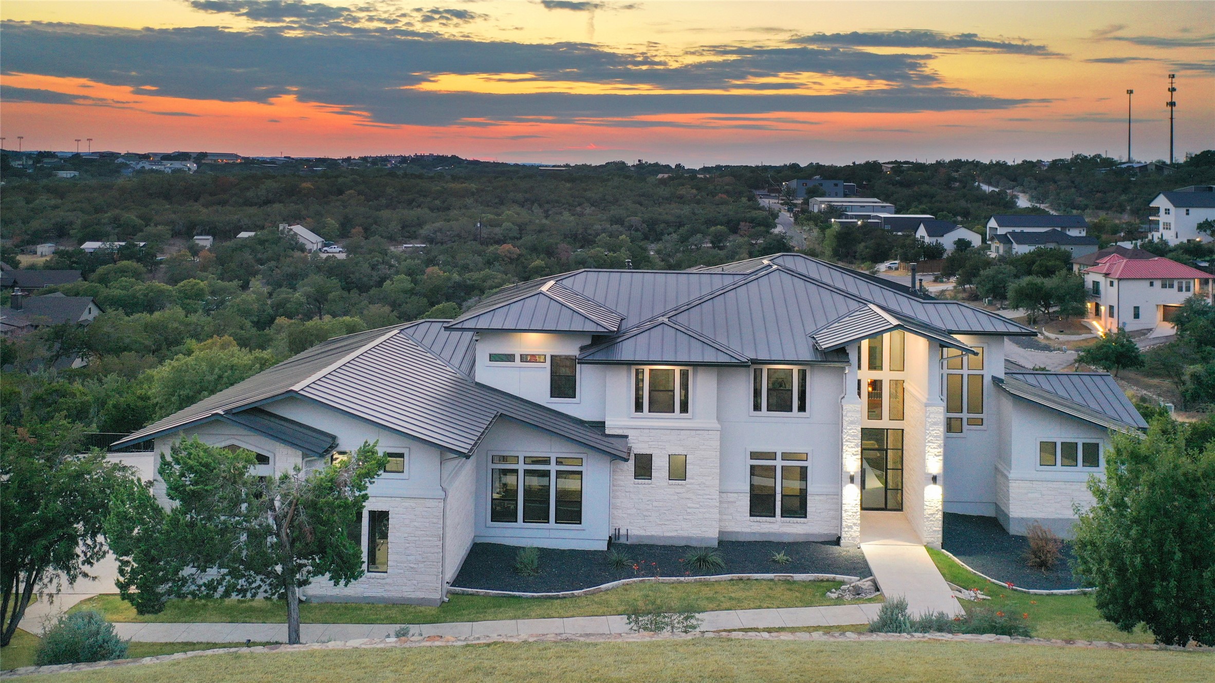 14900 Copper Ridge Lane Austin, TX 78734 - Photo 1 of 1 a view of a city with mountain