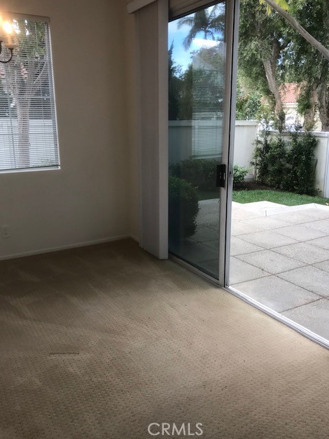 5 Laconia Irvine, CA 92614 - Photo 20 of 35 a view of a glass door and a yard