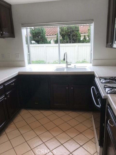 5 Laconia Irvine, CA 92614 - Photo 24 of 35 a kitchen with a sink and a stove