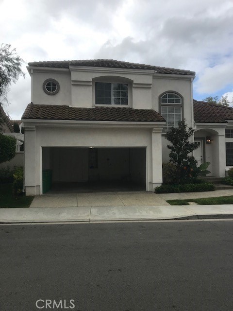 5 Laconia Irvine, CA 92614 - Photo 34 of 35 front view of a house with a garage