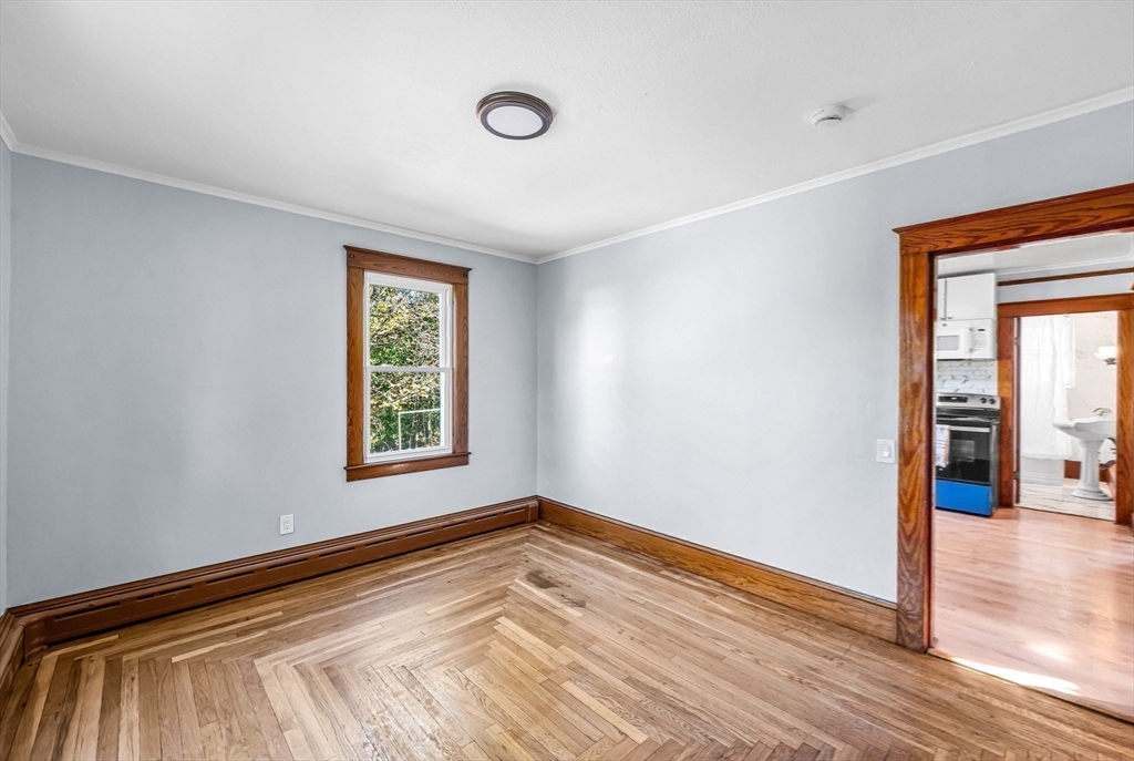 28 Maple Avenue Ware, MA 01082 - Photo 21 of 42 a view of a room with wooden floor and window