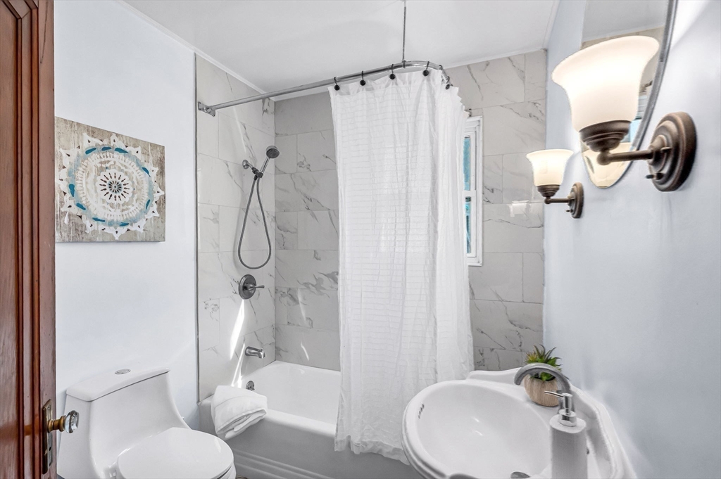 28 Maple Avenue Ware, MA 01082 - Photo 23 of 42 a bathroom with a sink toilet and shower