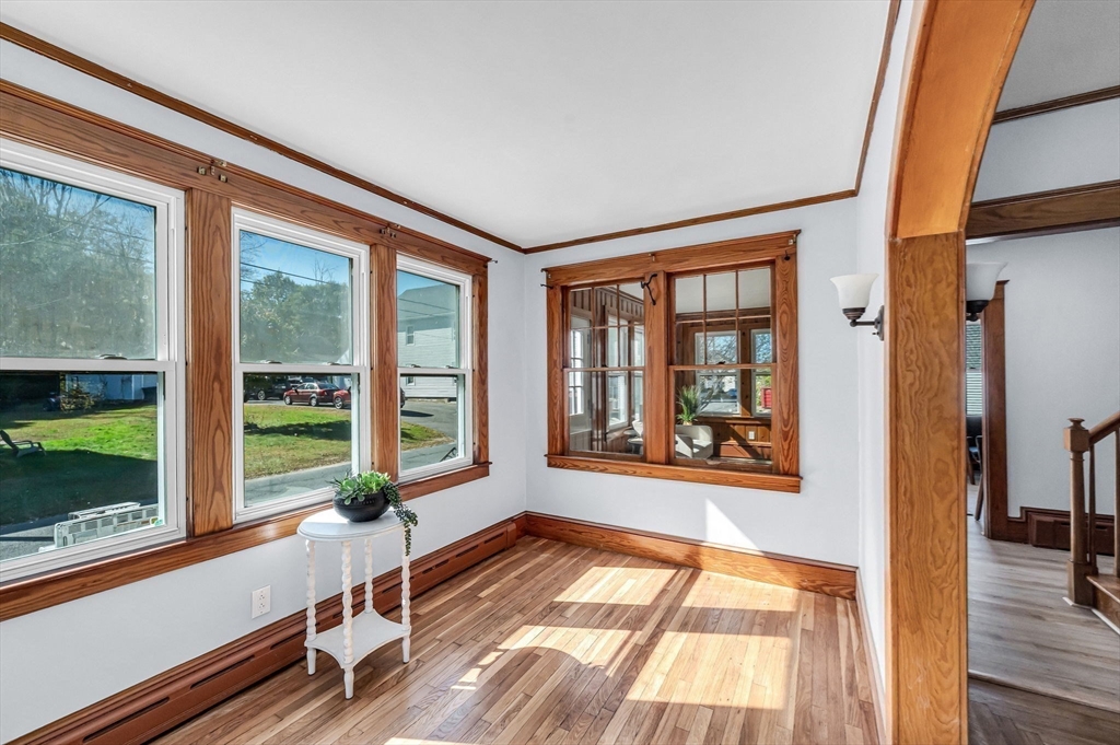 28 Maple Avenue Ware, MA 01082 - Photo 10 of 42 a view of a room with wooden floor and windows