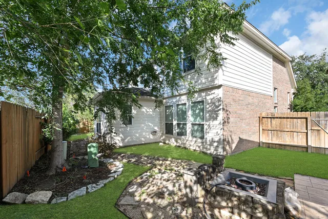 a view of a backyard with a garden
