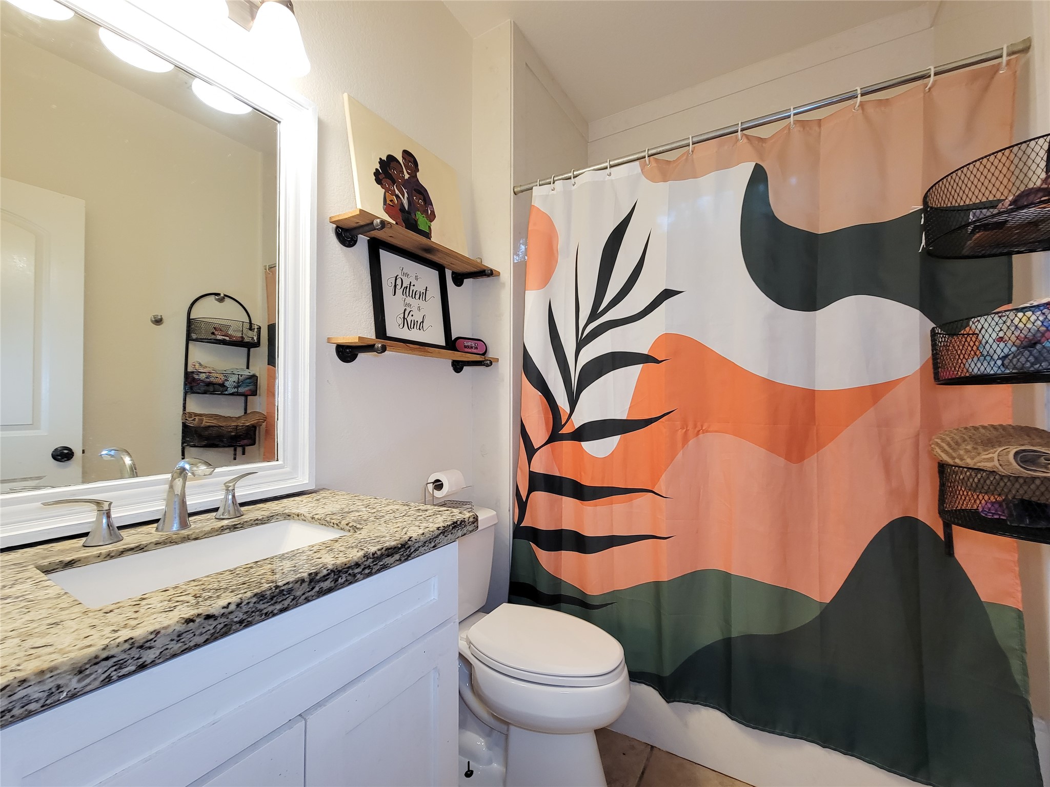 2011 Old Ox Road Spring, TX 77386 - Photo 27 of 38 a bathroom with a granite countertop sink and a mirror