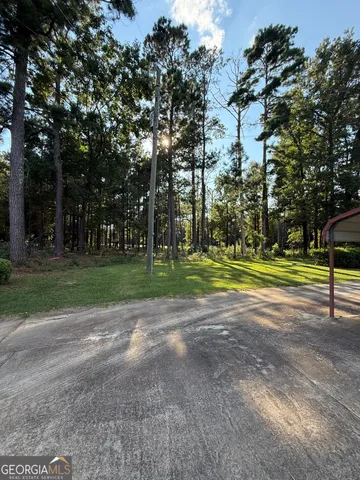 a bathroom with a shower and toilet