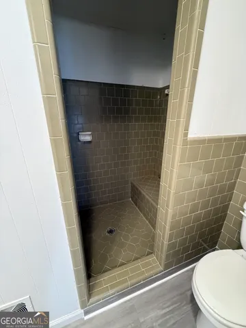 a bathroom with a sink a mirror and vanity