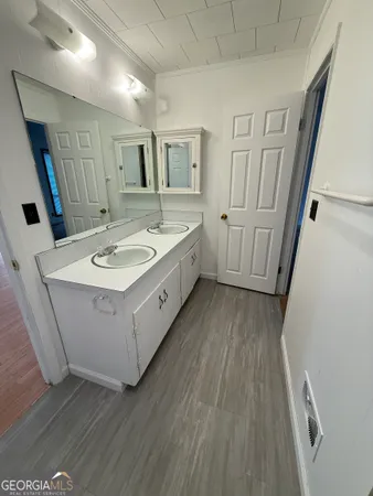 a view of a living room with a flat screen tv