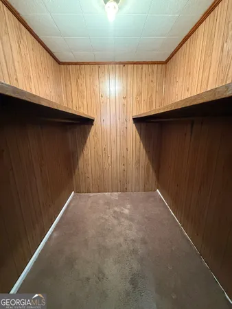 a bathroom with a shower and toilet