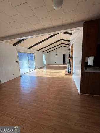 a bathroom with a sink a mirror and vanity