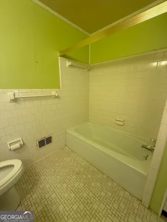 a bathroom with a sink and a large window