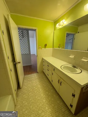 a view of a big room with closet and chandelier fan