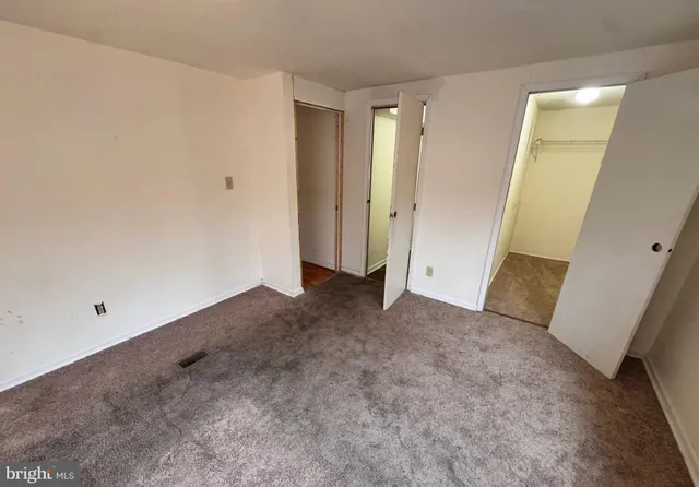 a bathroom with a sink toilet a mirror and shower
