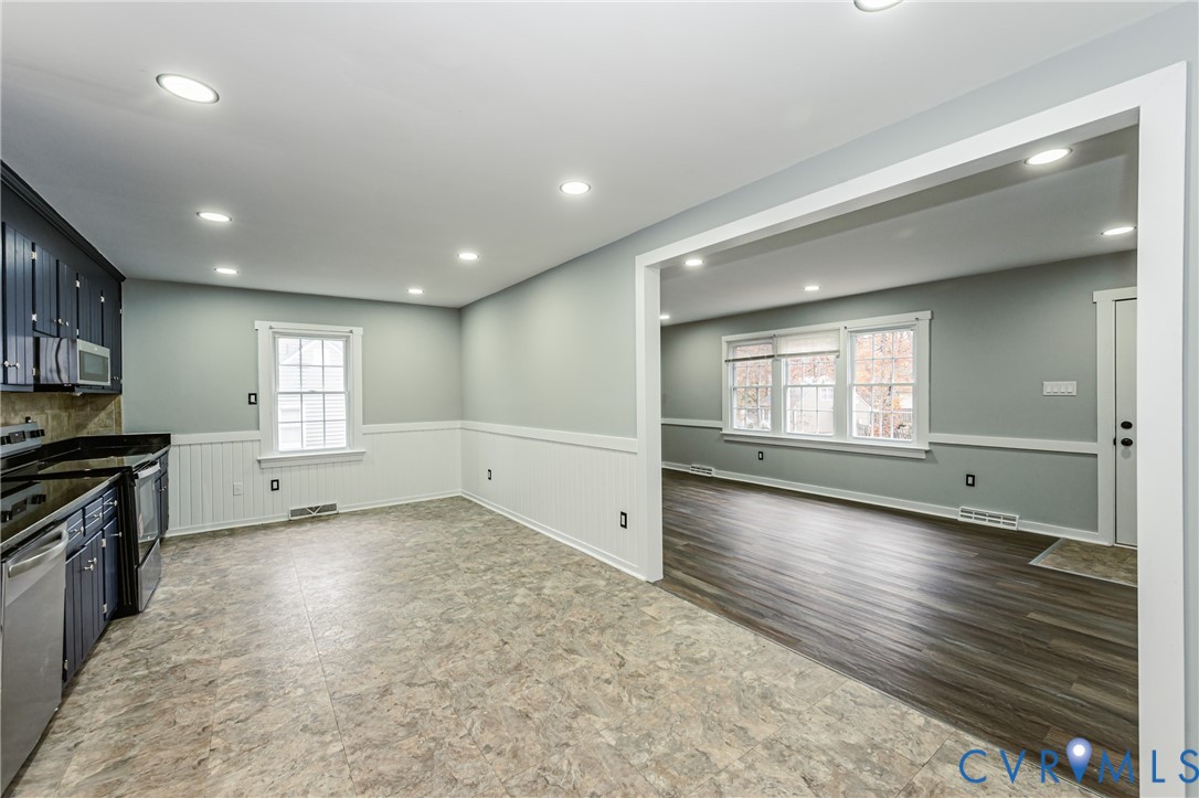 113 Eastman Road Chesterfield, VA 23236 - Photo 17 of 47 an empty room with wooden floor and windows