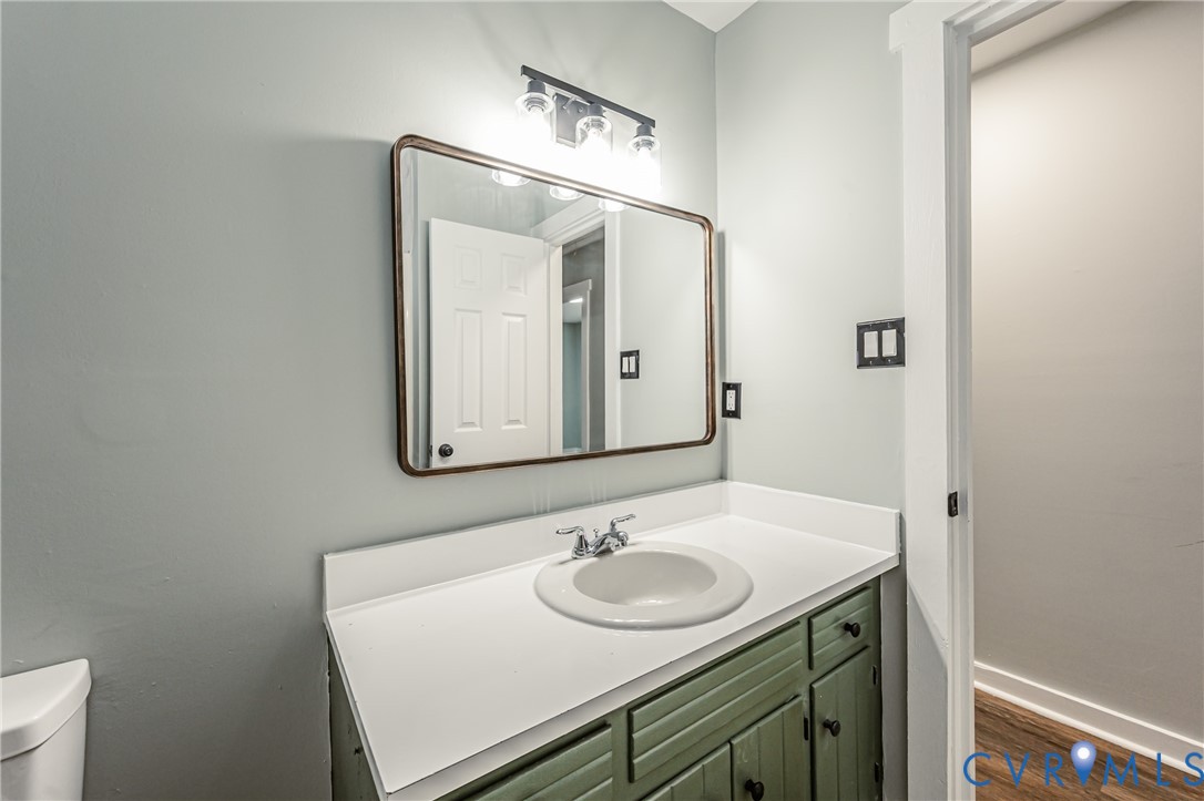 113 Eastman Road Chesterfield, VA 23236 - Photo 31 of 47 a bathroom with a sink and a mirror