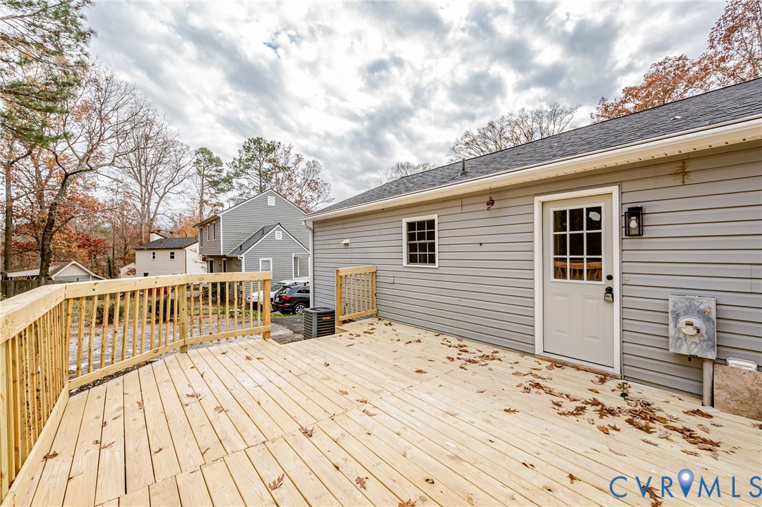 113 Eastman Road Chesterfield, VA 23236 - Photo 45 of 47 a view of a house with a wooden deck