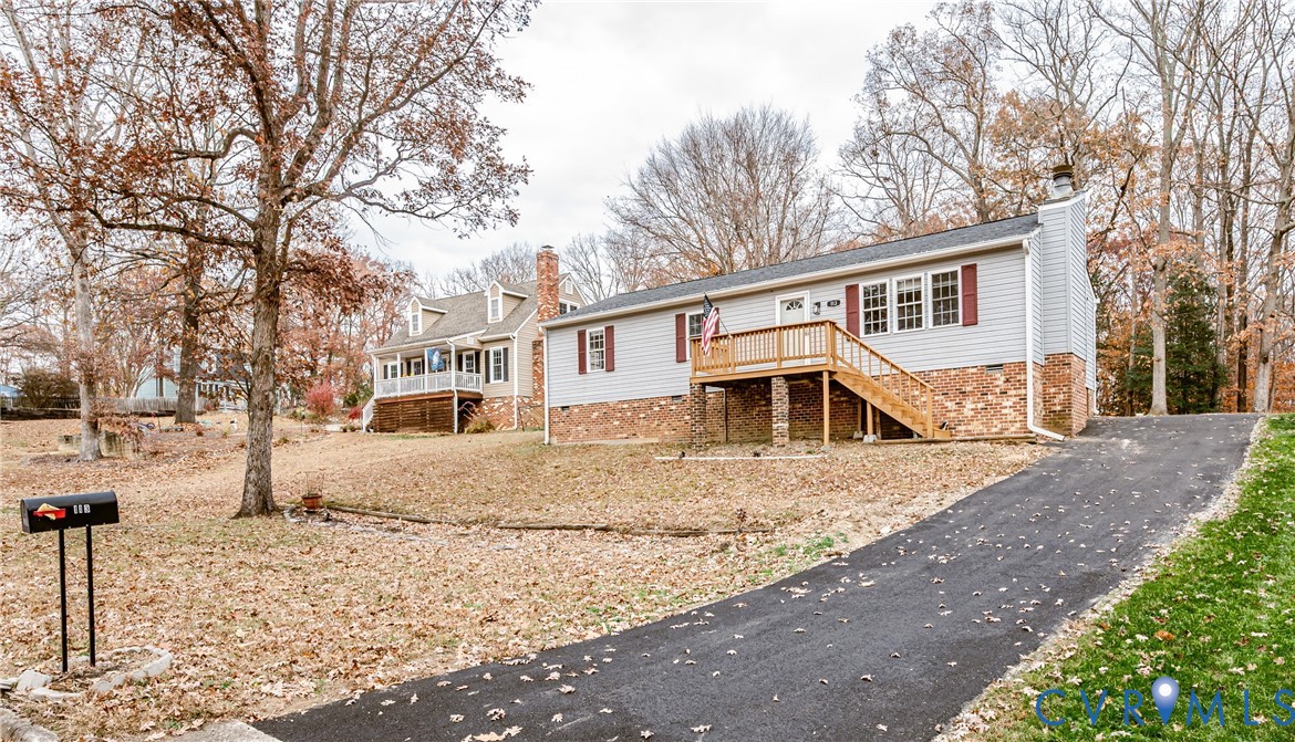 113 Eastman Road Chesterfield, VA 23236 - Photo 5 of 47 a front view of a house with a yard