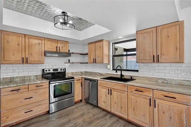 $329,000 | 203 Tree Swallow Court, Lehigh Acres, FL 33936