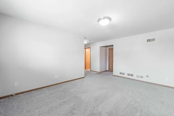 an empty room with an entryway