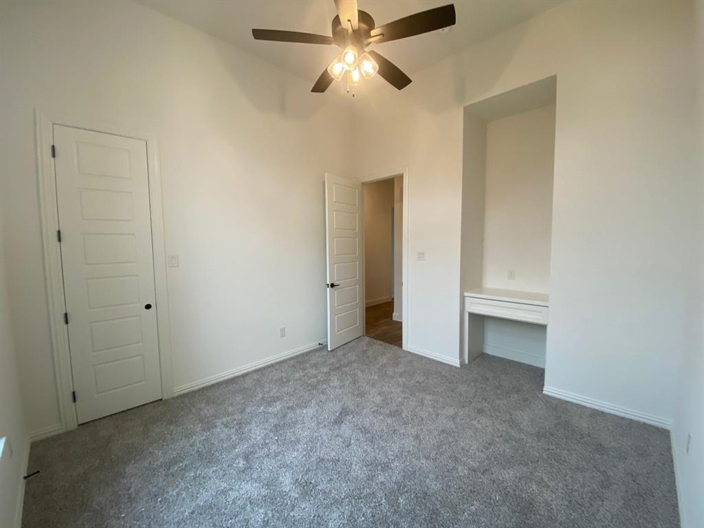 2284 Erwin Road Poolville, TX 76487 - Photo 19 of 24 Secondary room with desk