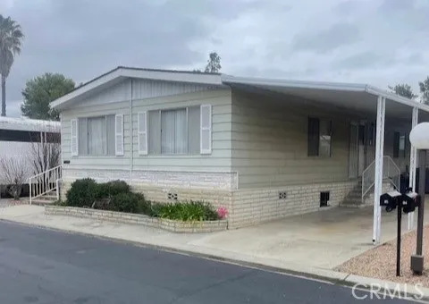 a front view of a house with garage