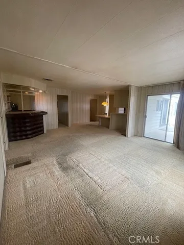 a view of a livingroom with furniture