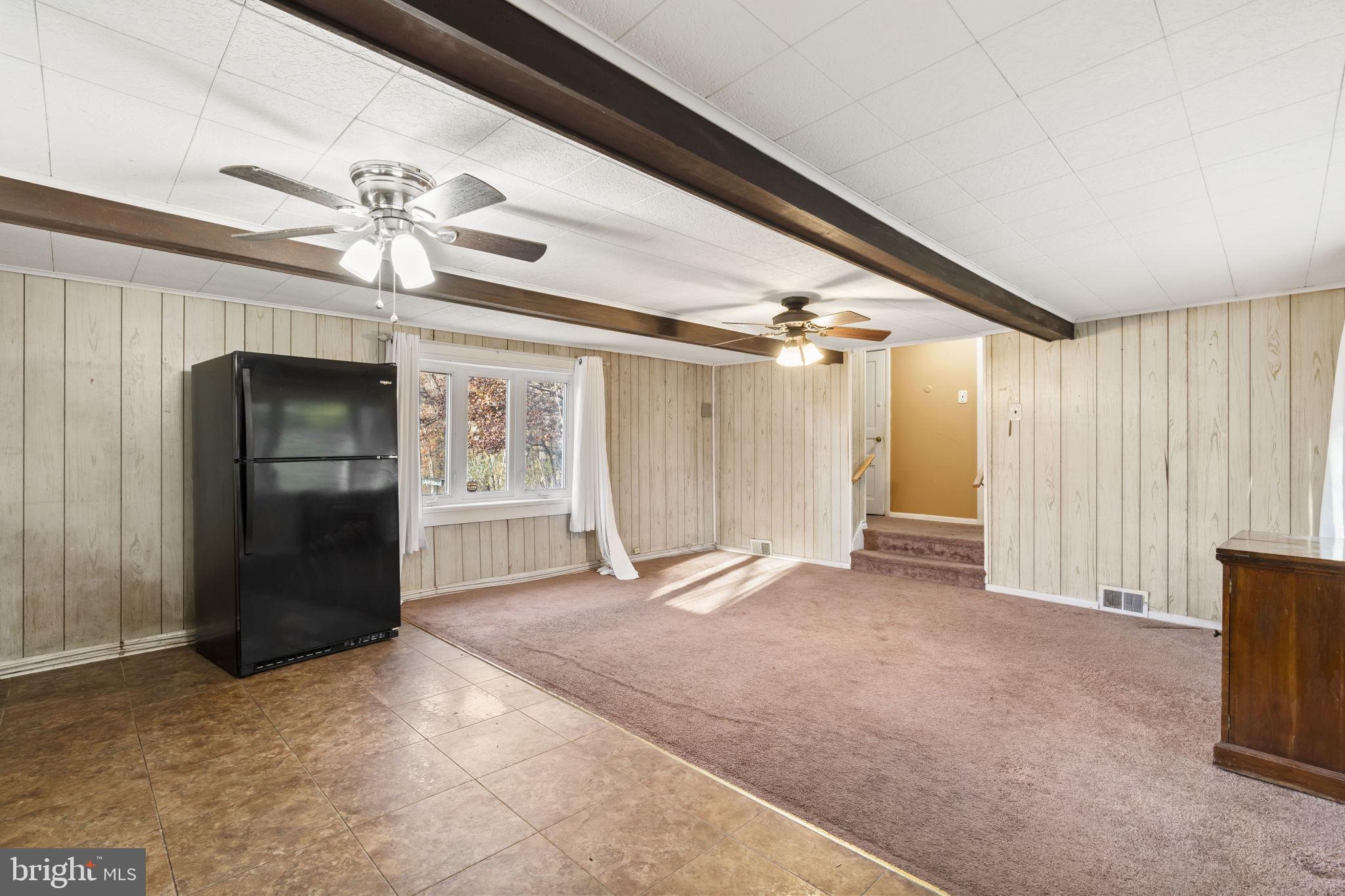 198 Glenrose Road Coatesville, PA 19320 - Photo 16 of 43 a view of an empty room with a window