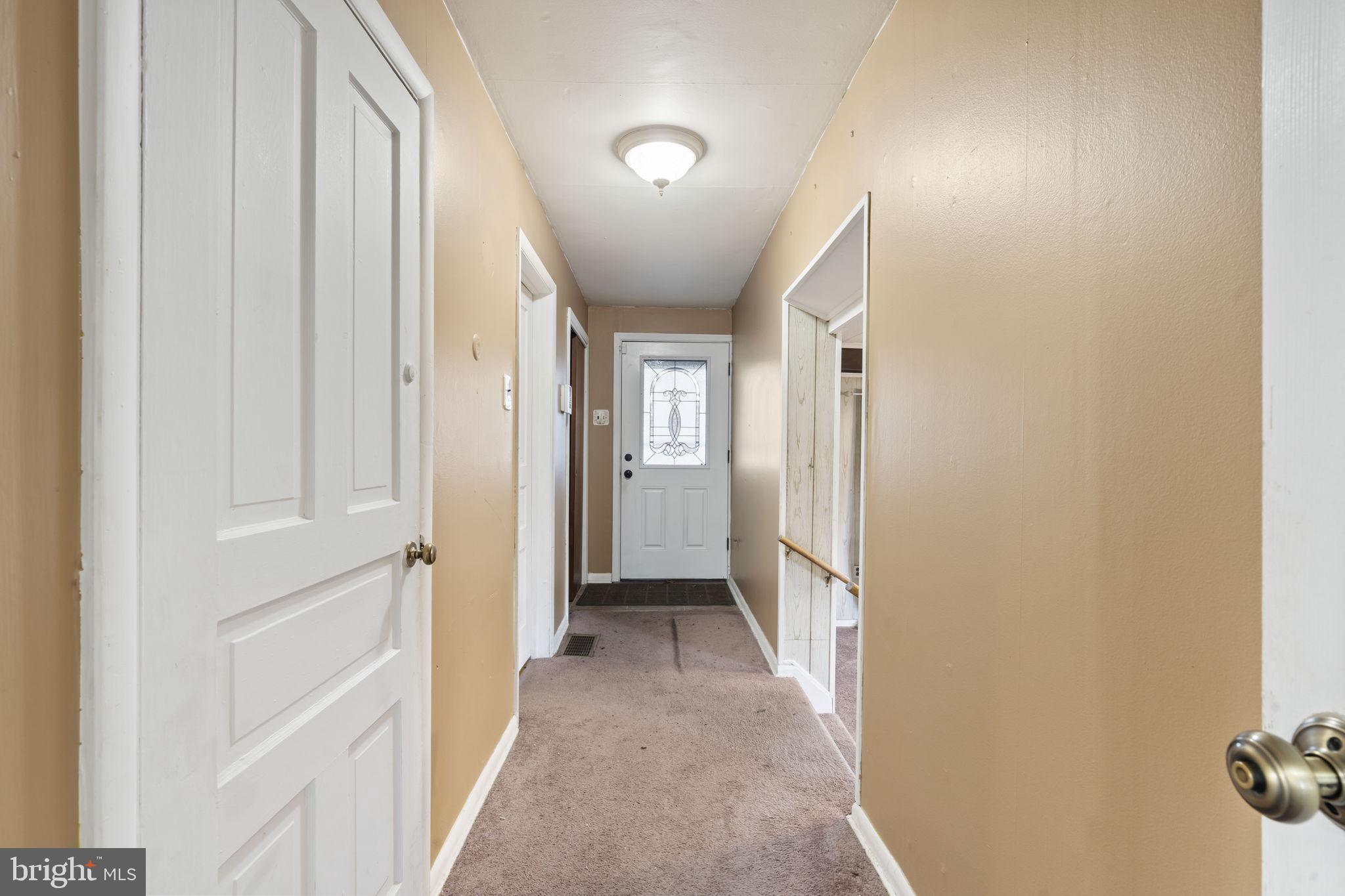 198 Glenrose Road Coatesville, PA 19320 - Photo 20 of 43 a view of a hallway with a white walls