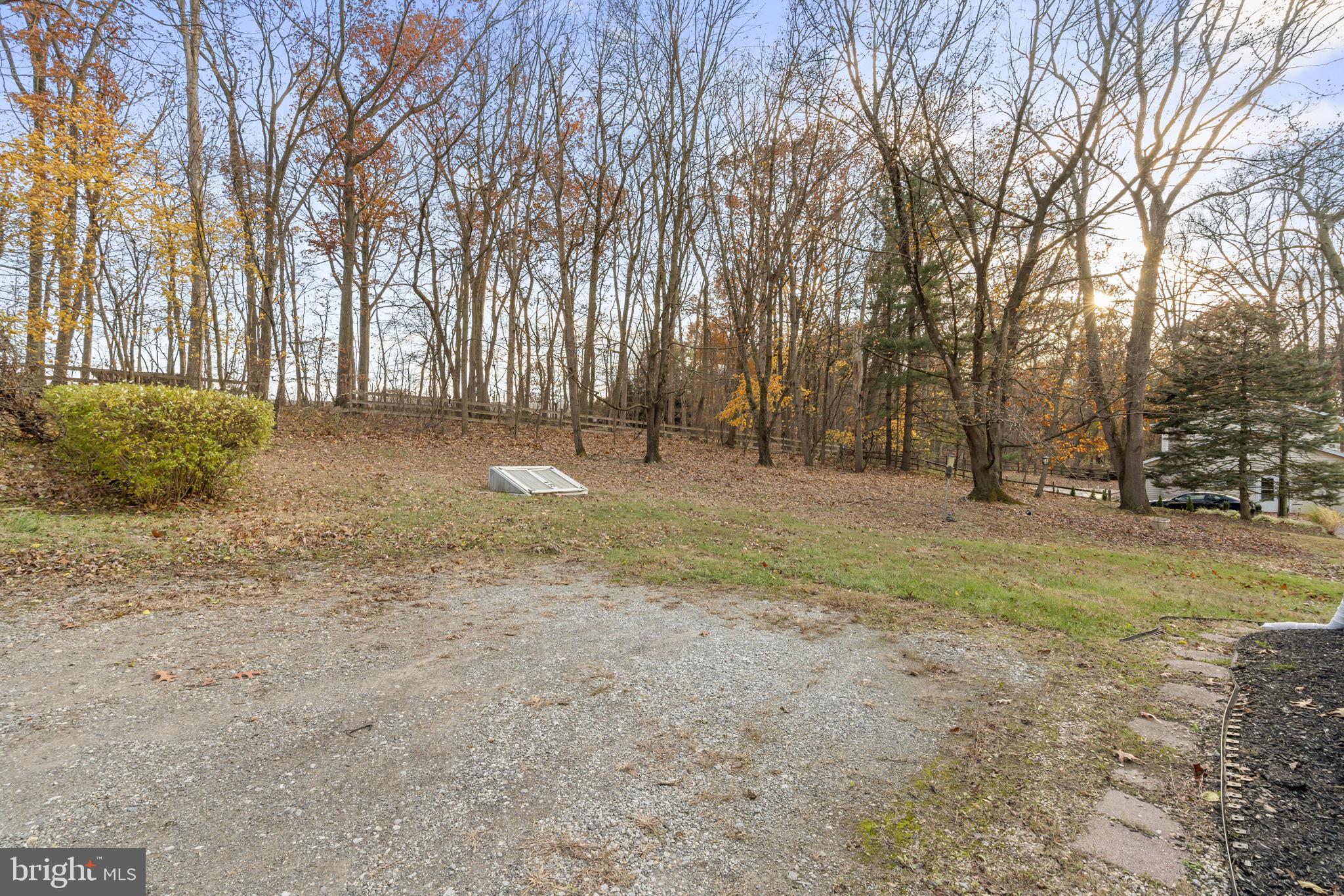 198 Glenrose Road Coatesville, PA 19320 - Photo 29 of 43 a backyard of apartments with trees