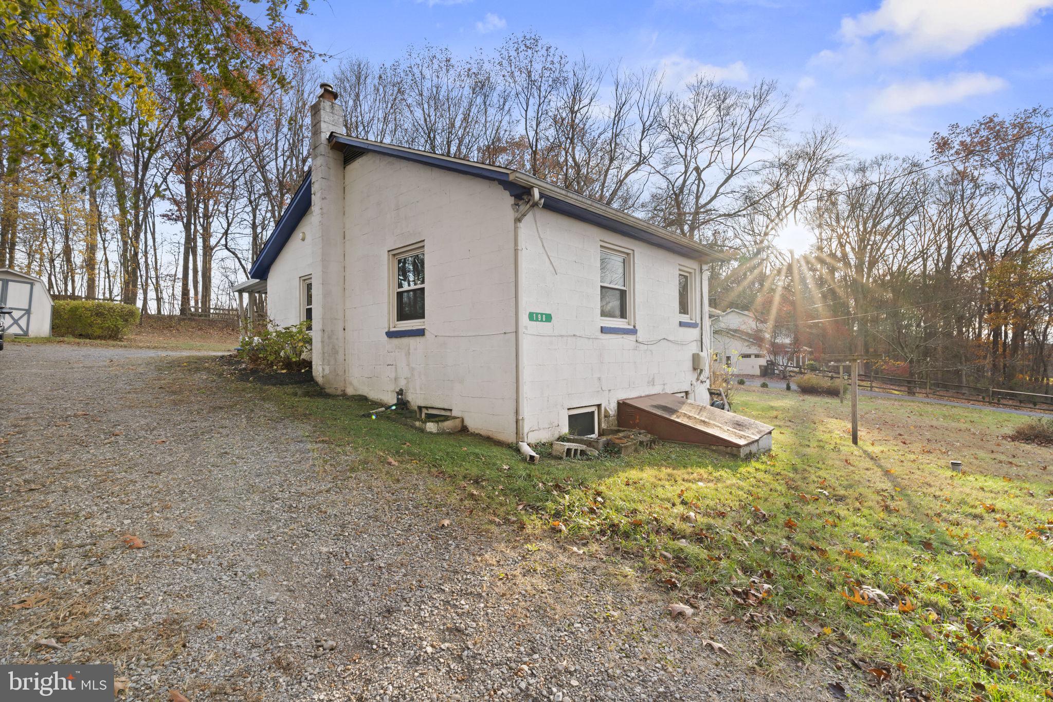 198 Glenrose Road Coatesville, PA 19320 - Photo 9 of 43 a view of a house with a yard