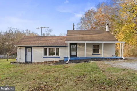 front view of house with a yard