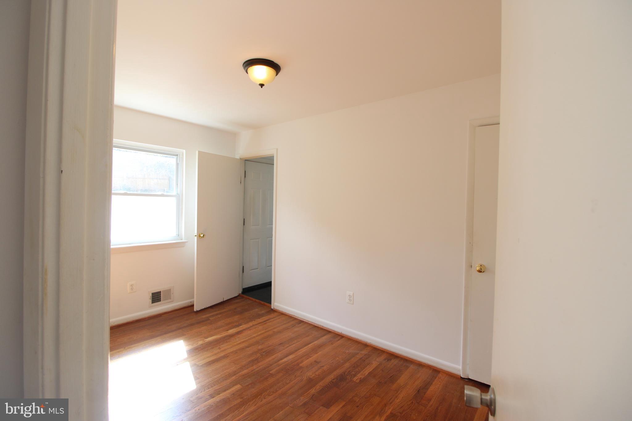 4416 Randolph Road Silver Spring, MD 20906 - Photo 15 of 27 a view of an empty room and window