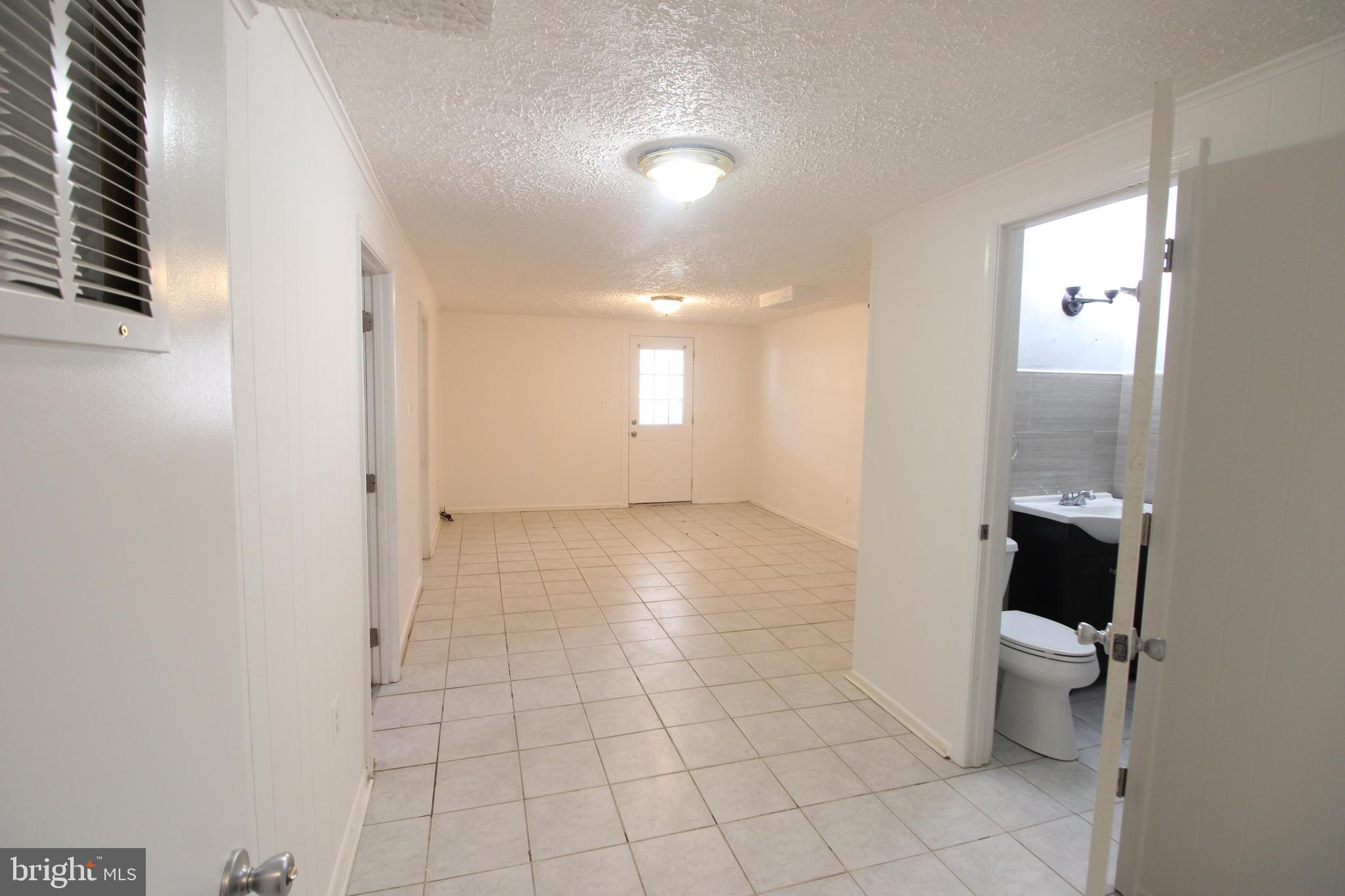4416 Randolph Road Silver Spring, MD 20906 - Photo 20 of 27 a view of a bathroom with a sink and a toilet