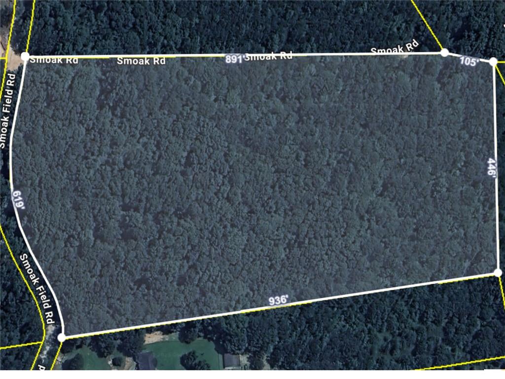 176 Smoak Field Road Griffin, GA 30223 - Photo 12 of 13 a black and white wall with a close view of wooden fence