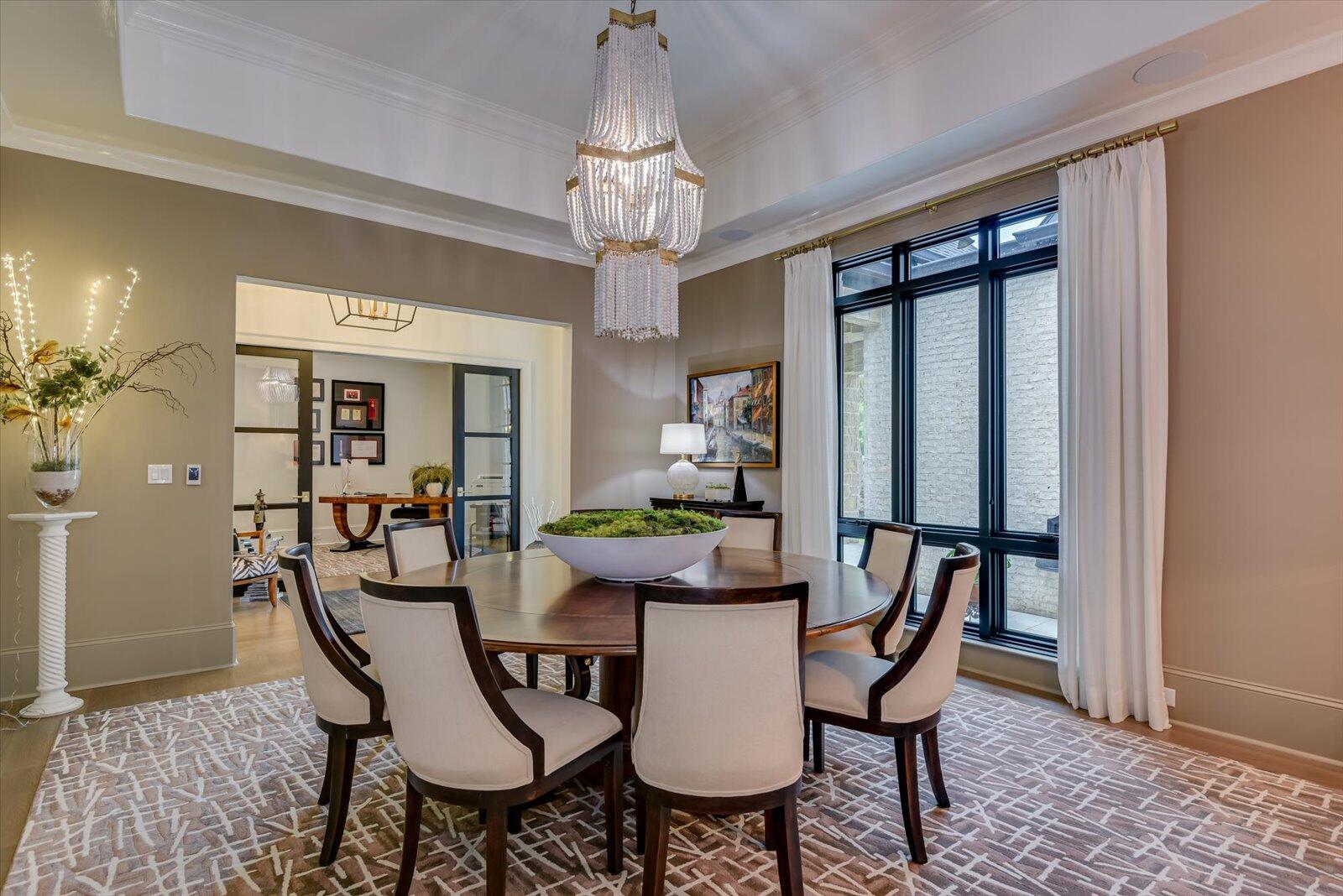 2025 Grace Avenue Evans, GA 30809 - Photo 21 of 70 Dining Room- High gloss trey ceiling. Floor to ceiling window overlooking the court yard and fountain.
