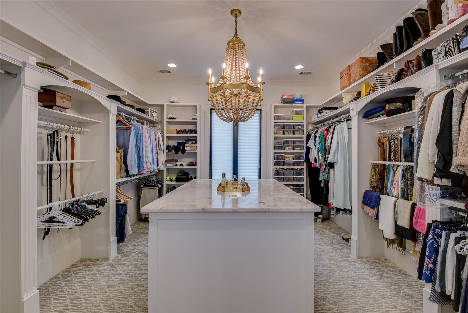 2025 Grace Avenue Evans, GA 30809 - Photo 28 of 70 Master Closet- Quartzite countertop on center custom dresser. Built-in cabinets.