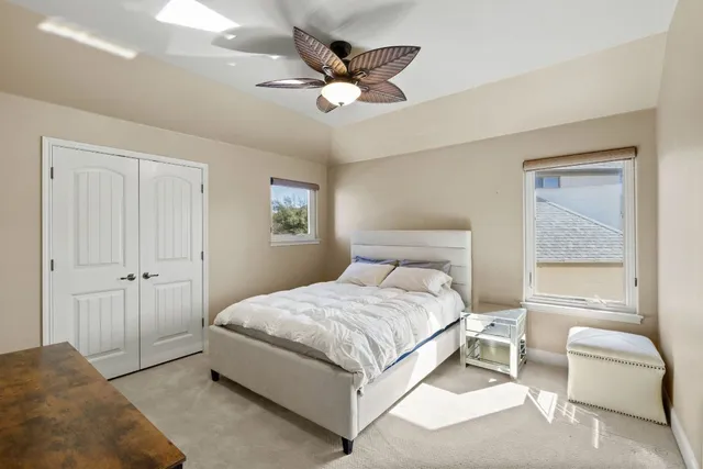 an aerial view of a house with a swimming pool