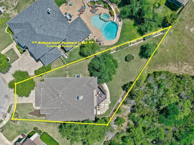 a view of an empty room with a fireplace