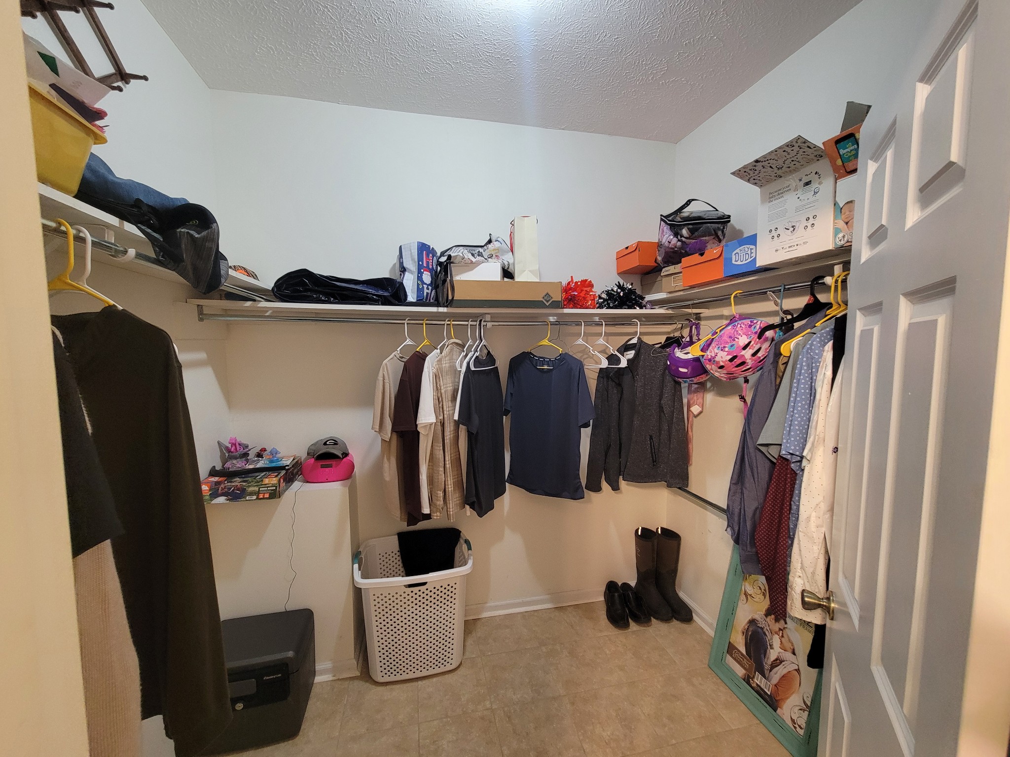 575 Haywood Creek Road Pulaski, TN 38478 - Photo 12 of 29 a view of walk in closet with clothes and shoes