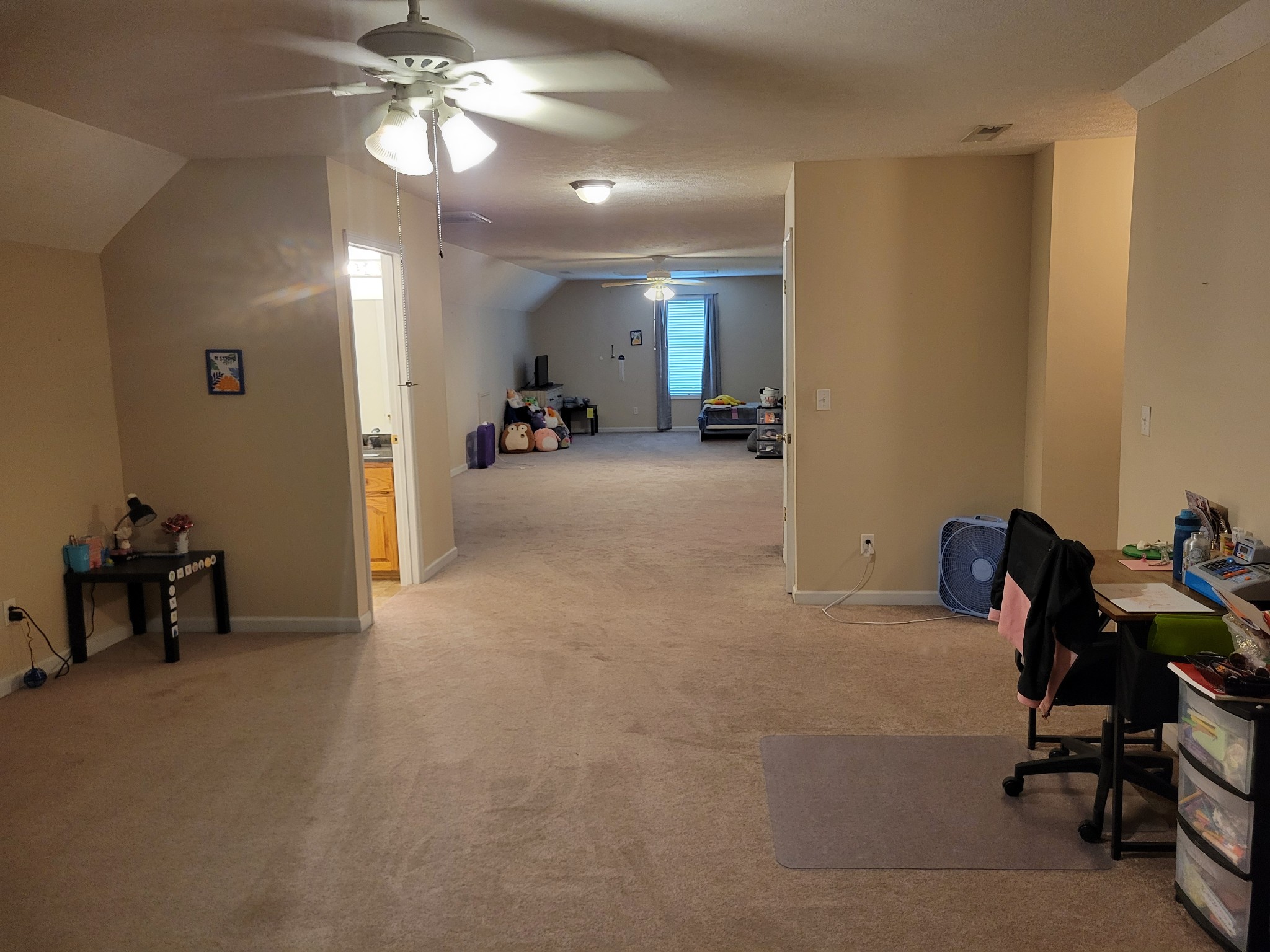 575 Haywood Creek Road Pulaski, TN 38478 - Photo 13 of 29 a view of a livingroom with a furniture and a ceiling fan