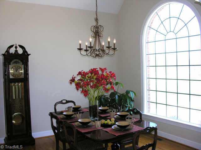 7493 Bethel View Court Oak Ridge, NC 27310 - Photo 5 of 9 Other. Large Dining Room With Paladian Window.