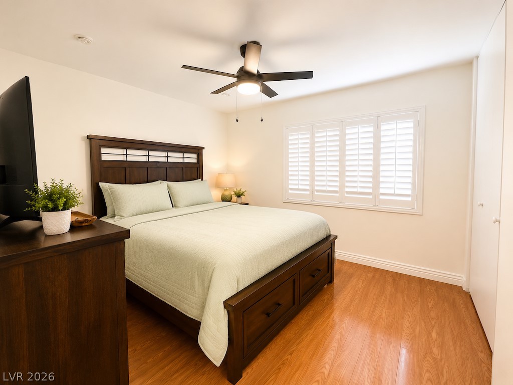 3010 East Viking Road Las Vegas, NV 89121 - Photo 23 of 48 Comfortable sleeping quarters feature warm wood floors and ample natural light.