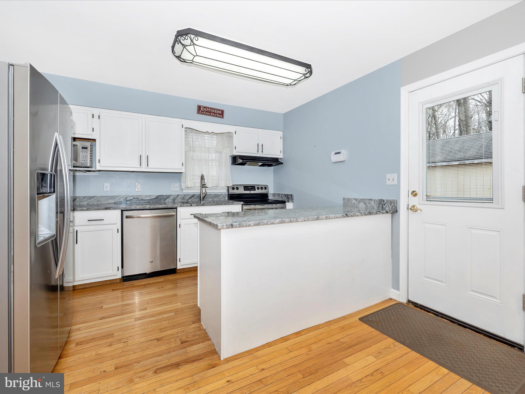 14108 Peddicord Road Mount Airy, MD 21771 - Photo 11 of 43 Kitchen with gorgeous granite counters