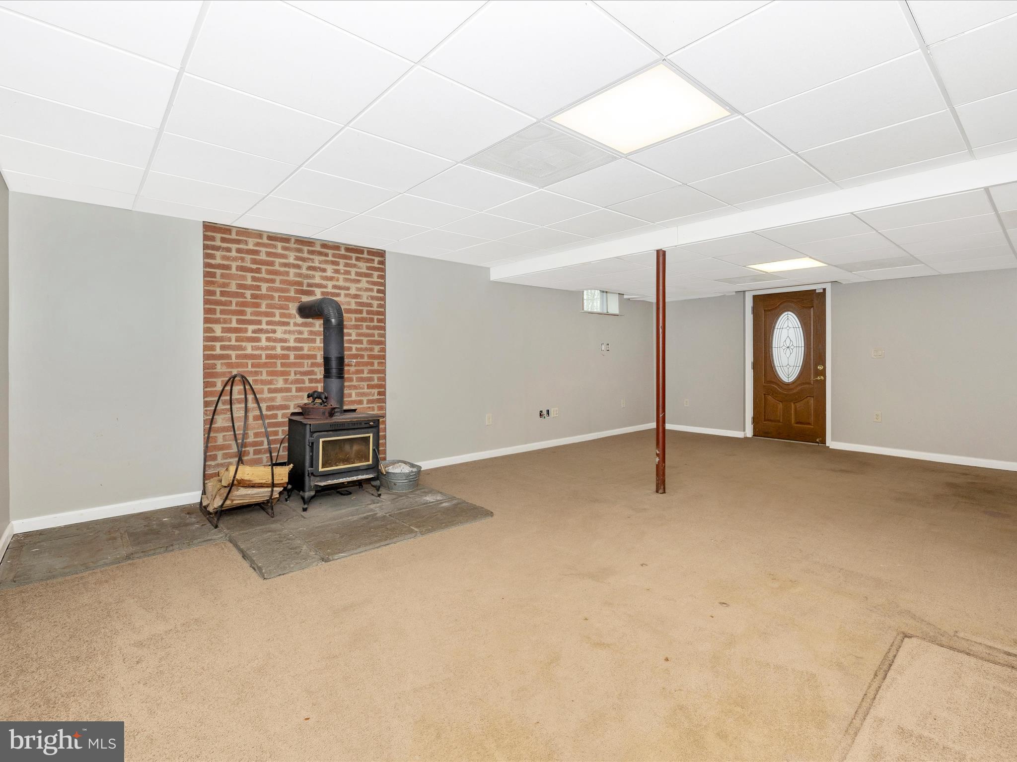 14108 Peddicord Road Mount Airy, MD 21771 - Photo 25 of 43 Lovely woodstove in lower level
