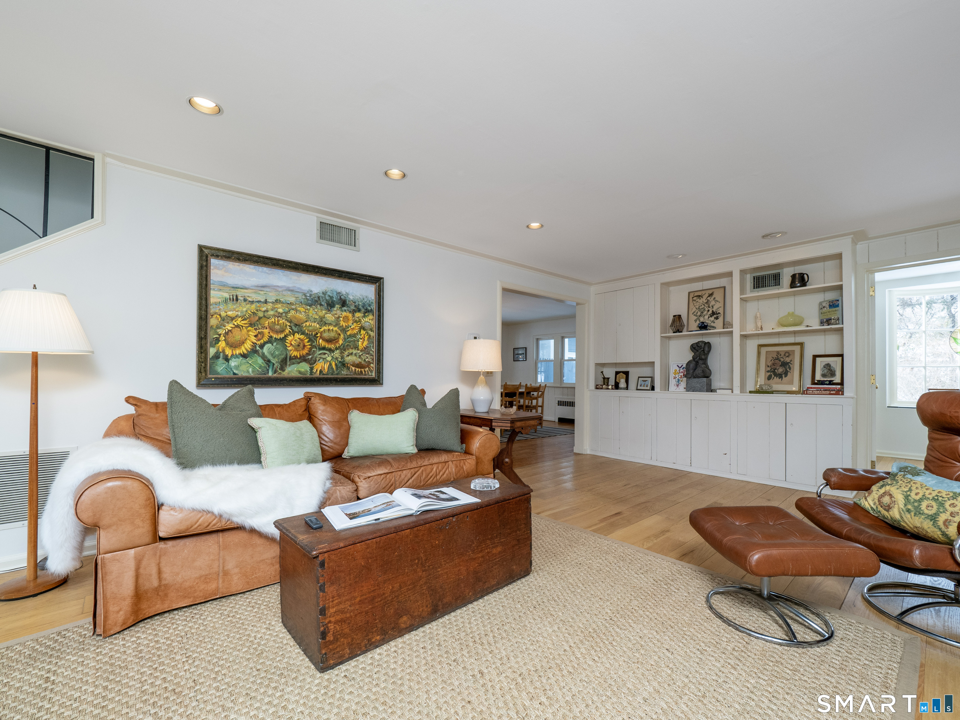 340 Sturges Ridge Road Wilton, CT 06897 - Photo 15 of 40 a living room with furniture and wooden floor