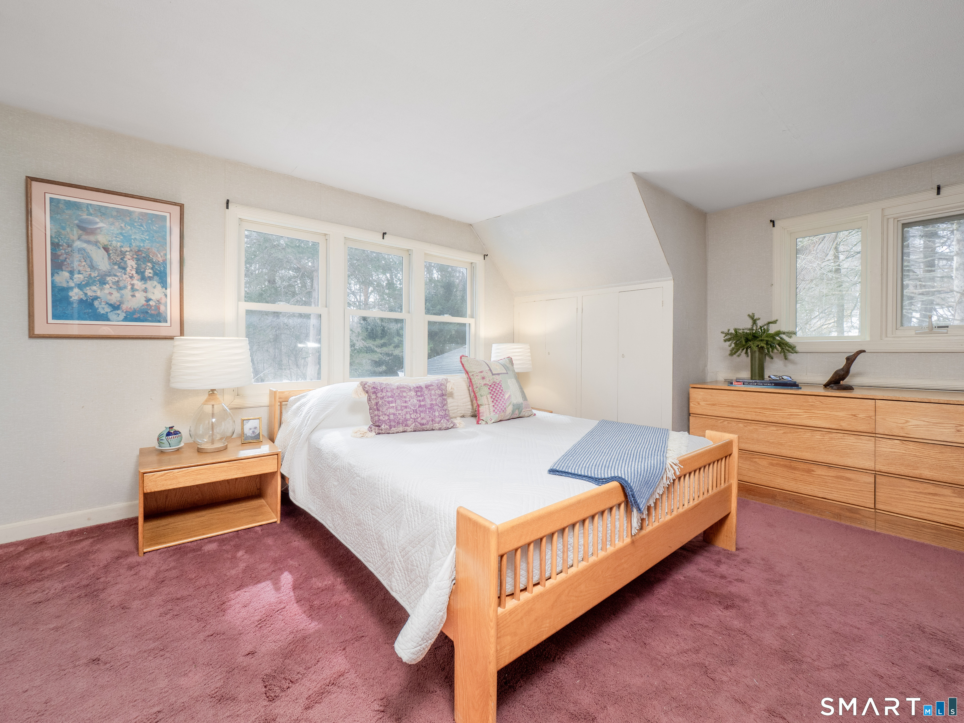 340 Sturges Ridge Road Wilton, CT 06897 - Photo 20 of 40 a bed room with a bed and a chair
